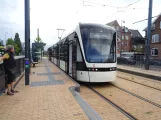 Odense Tramway with low-floor articulated tram 14 "Pusterummet" at Vestre Stationsvej (2022)