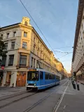 Oslo tram line 12 with articulated tram 128 on Prinsens gate (2023)
