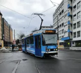 Oslo tram line 12 with articulated tram 129 in the intersection Storgata/Hausmanns gate (2020)