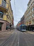 Oslo tram line 13 with low-floor articulated tram 161 on Prinsens gata (2023)