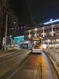 Oslo tram line 18 with low-floor articulated tram 141 on Kirkeristen (2022)