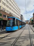 Oslo tram line 18 with low-floor articulated tram 401 on Storgata (2022)