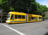 Portland tram line NS with low-floor articulated tram 023, side view SW 11th & Jefferson (2016)