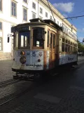 Porto tram line 22 with railcar 220 at Carmo seen from behind (2019)