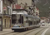 Postcard: Grenoble tram line A with low-floor articulated tram 2016 in front of Le Tram, Avenue Aristide Briand (1988)