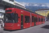Postcard: Innsbruck Stubaitalbahn (STB) with low-floor articulated tram 352 at Hauptbahnhof (2009)