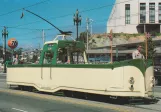 Postcard: San Francisco F-Market & Wharves with railcar 228 in the intersection Market Streets/Duboce Avenue (1986)