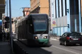 Rome tram line 19 with low-floor articulated tram 9107 on Via dei Reti (2010)