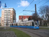 Rostock tram line 1 with low-floor articulated tram 606 on Neuer Markt (2015)