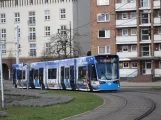 Rostock tram line 1 with low-floor articulated tram 607 on Neuer Markt (2015)