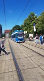 Rostock tram line 1 with low-floor articulated tram 666 at Neuer Markt (2022)