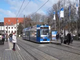 Rostock tram line 1 with low-floor articulated tram 676 at Neuer Markt (2015)