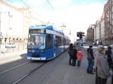 Rostock tram line 1 with low-floor articulated tram 676 on Lange Straße (2015)