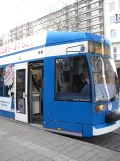 Rostock tram line 5 with low-floor articulated tram 677, the front Lange Str. (2015)