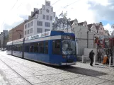 Rostock tram line 5 with low-floor articulated tram 686 at Neuer Markt seen from the side (2015)