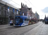 Rostock tram line 6 with low-floor articulated tram 672 at Neuer Markt (2015)