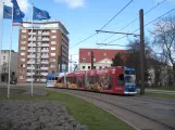 Rostock tram line 6 with low-floor articulated tram 672 on Neuer Markt (2015)