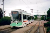 Saint-Étienne tram line T1 with low-floor articulated tram 915 at Clinique de Parc (2007)