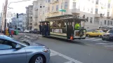San Francisco cable car Powell-Hyde with cable car 26 in the intersection Mason Street/Washington Street (2019)