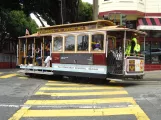 San Francisco cable car Powell-Hyde with cable car 28 in the intersection Hyde Street / Jackson Street (2023)