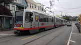 San Francisco tram line N Judah with articulated tram 1495 at 9th Ave & Irving St. (2021)