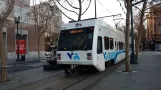 San Jose Green Line (902) with low-floor articulated tram 991 near San Antonio (2021)