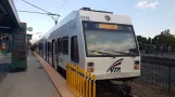 Santa Clara regional line Orange 900 with low-floor articulated tram 976 at Mountain View (2019)