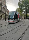 Seville tram line T1 with low-floor articulated tram 301 at Plaza Nueva (2023)
