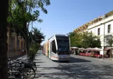 Seville tram line T1 with low-floor articulated tram 301 on Calle San Fernando (2017)
