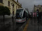 Seville tram line T1 with low-floor articulated tram 302 at Archivo de Indias (2023)
