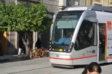 Seville tram line T1 with low-floor articulated tram 303 on Av. de la Constitución (2018)