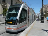 Seville tram line T1 with low-floor articulated tram 304 at Archivo de Indias (2014)