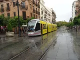 Seville tram line T1 with low-floor articulated tram 304 on Avenida de la Constitución (2023)