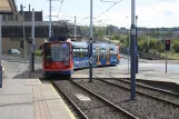 Sheffield Purple Route with low-floor articulated tram 115 at Woodbourn Rd (2011)