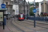 Sheffield tram line Blue with low-floor articulated tram 116 on Commercial Road (2011)