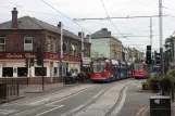 Sheffield tram line Purple with low-floor articulated tram 112 on Langsett Road (2011)