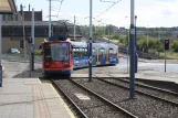Sheffield tram line Purple with low-floor articulated tram 115 at Woodbourn Road (2011)
