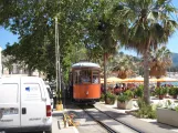 Sóller tram line with railcar 24 in front of Strandcafe I Soller, Carrer de la Marina (2013)