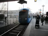 Stockholm tram line 30 Tvärbanan with low-floor articulated tram 464 at Gullmarsplan (2019)
