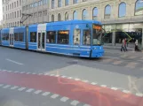 Stockholm tram line 7S Spårväg City with low-floor articulated tram 1 on Hamngaten (2019)