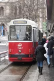 Vienna tram line 1 with sidecar 1502 at Schottentor (2013)