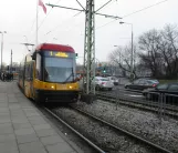 Warsaw tram line 1 with low-floor articulated tram 3247 at Rondo Żaba (2018)