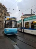 Zürich tram line 13 with low-floor articulated tram 3053 on Paradeplatz, front view (2021)