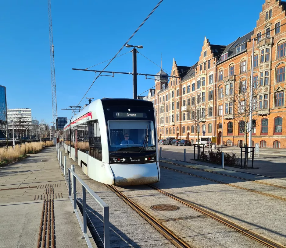 Aarhus light rail line L1 with low-floor articulated tram 2106-2206 on Kystvejen (2021)