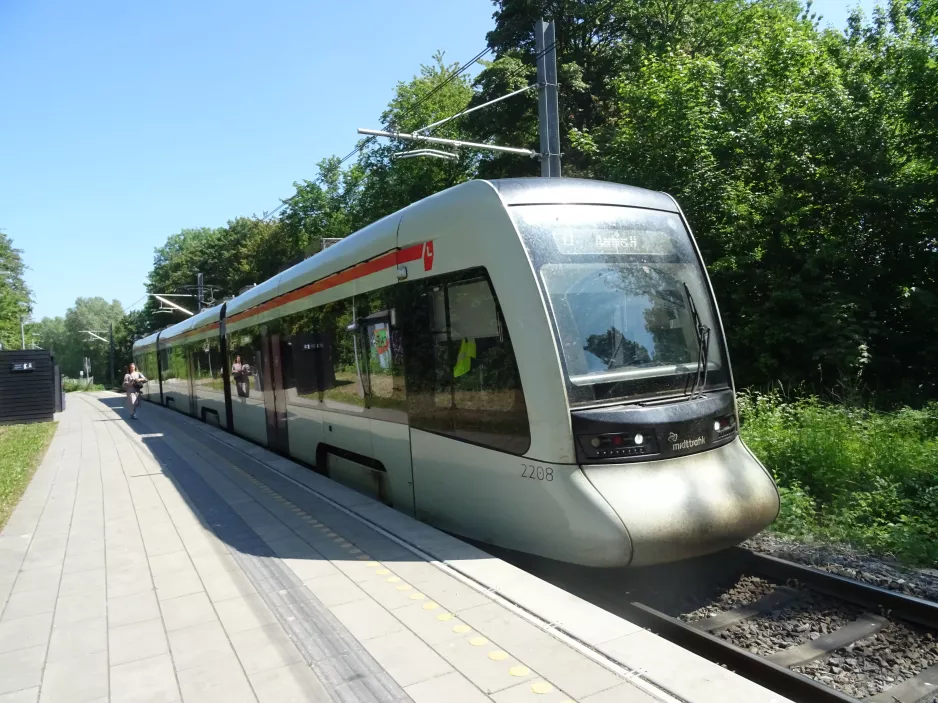 Aarhus light rail line L1 with low-floor articulated tram 2108-2208 at Hovmarken (2023)