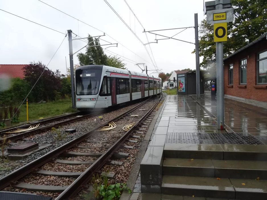 Aarhus light rail line L2 with low-floor articulated tram 1101-1201 at Tranbjerg (2022)