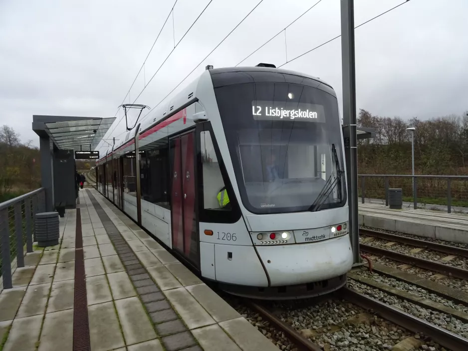 Aarhus light rail line L2 with low-floor articulated tram 1106-1206 at Gl. Skejby (2022)