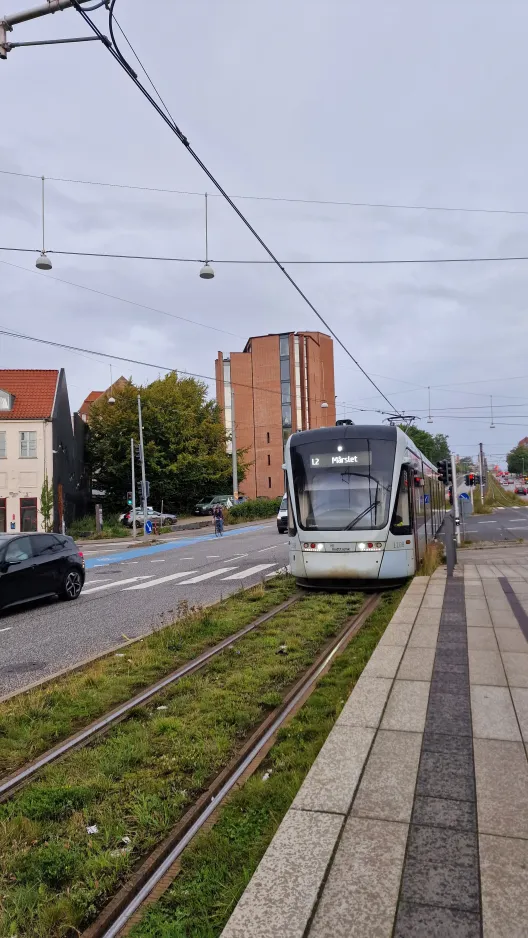 Aarhus light rail line L2 with low-floor articulated tram 1108-1208 close by Nørreport (2024)