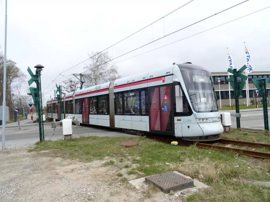 Aarhus light rail line L2 with low-floor articulated tram 1108-1208 in the intersection Gunner Clausensvej (2021)