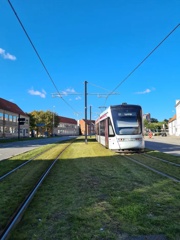 Aarhus light rail line L2 with low-floor articulated tram 1110-1210 on Nørreport (2021)